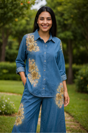 Casual two-piece set: heavy floral denim shirt, loose lapel beaded top, and wide-leg jeans