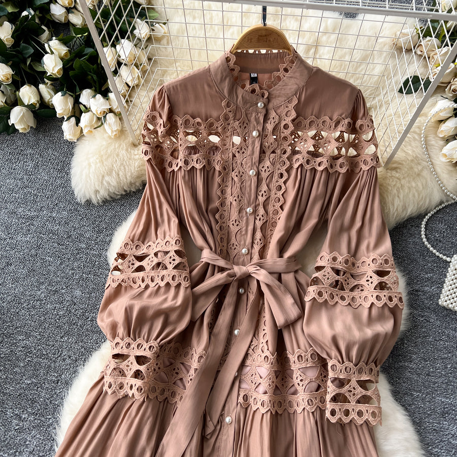 Long dress with embroidery, high neck, flared sleeves with high quality bows