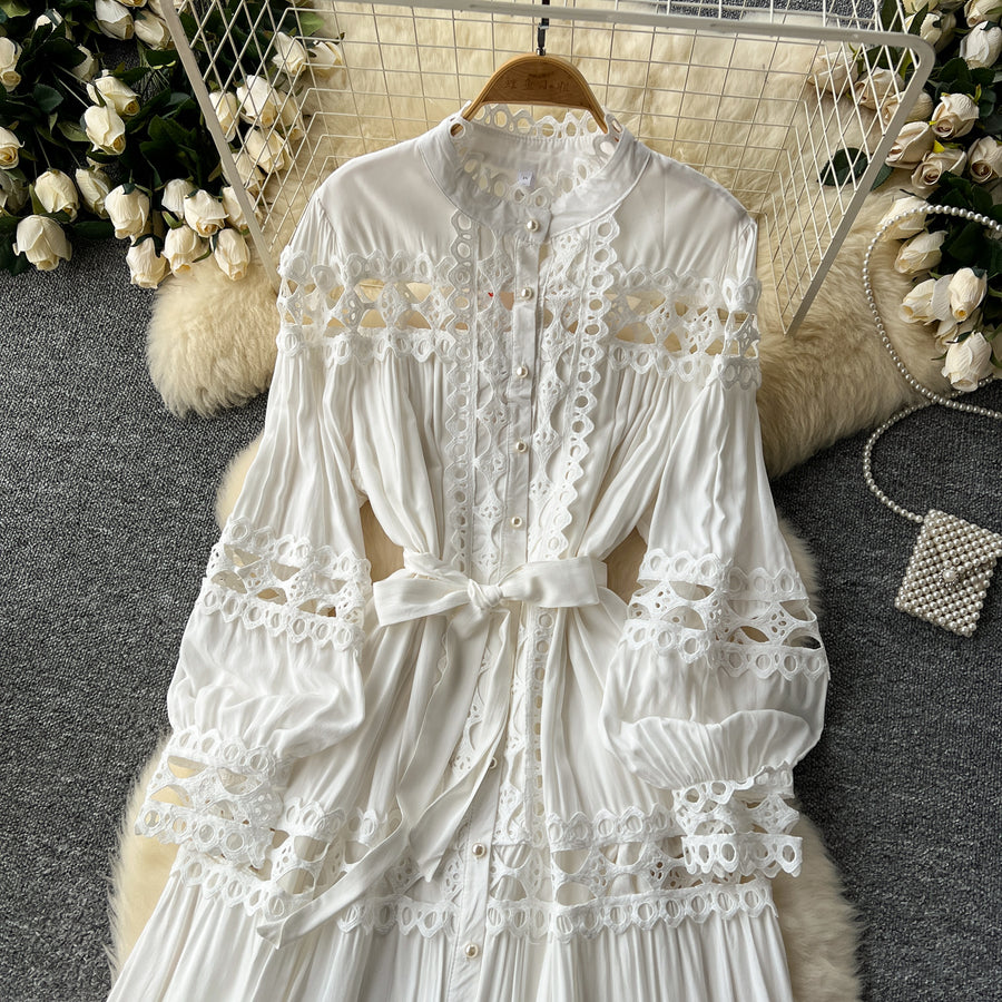 Long dress with embroidery, high neck, flared sleeves with high quality bows