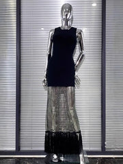 Black bodycon dress with tassel hem and shiny mesh with diamonds