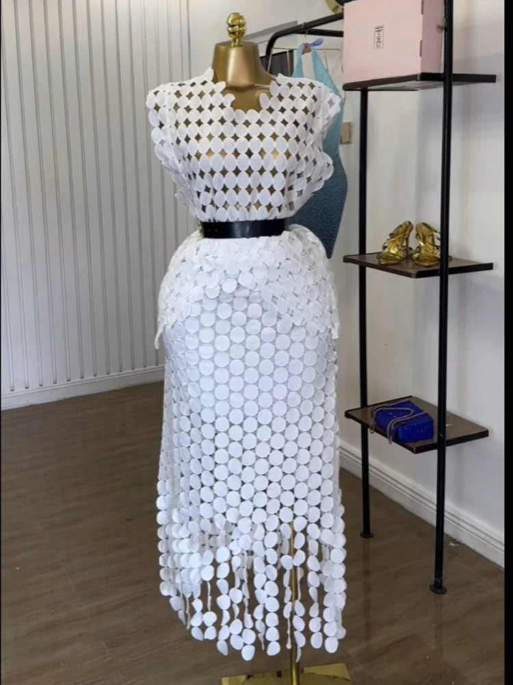 Women's two-piece set, featuring a round neck crop top and a long fitted midi skirt.