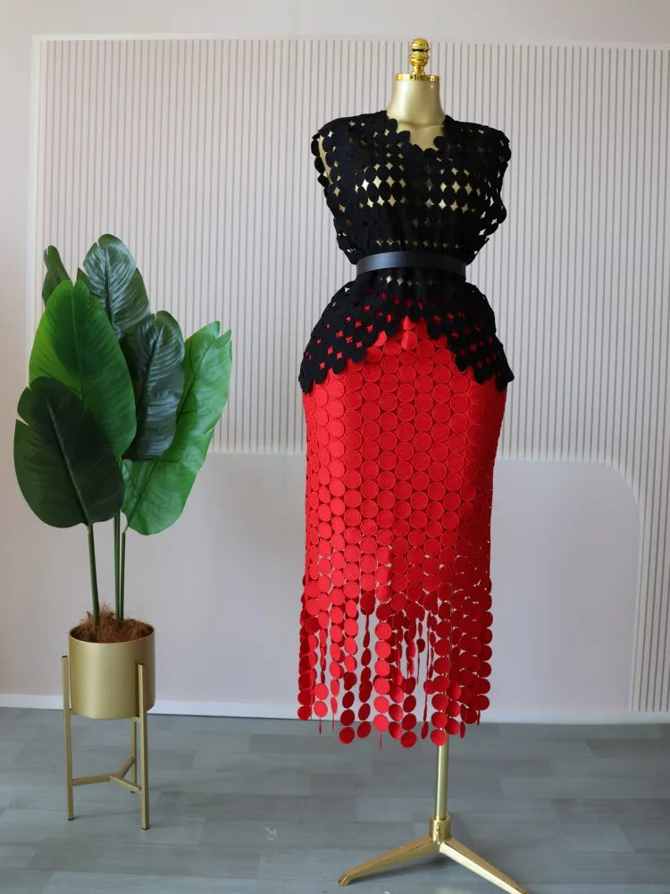 Women's two-piece set, featuring a round neck crop top and a long fitted midi skirt.