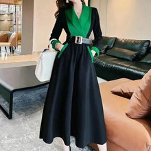Elegant long-sleeved dress with a wide, fluid skirt that enhances the high-quality figure