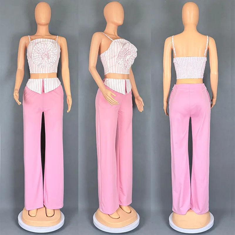 Short two-piece set with striped straps and floral appliqués, wide-legged pants