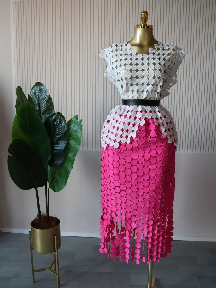 Women's two-piece set, featuring a round neck crop top and a long fitted midi skirt.