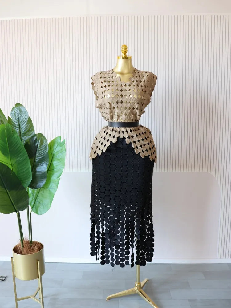Women's two-piece set, featuring a round neck crop top and a long fitted midi skirt.