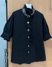 Shirt with buttons, ruffles, cotton stand-up collar and three-quarter sleeves of high quality