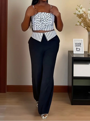 Short two-piece set with striped straps and floral appliqués, wide-legged pants