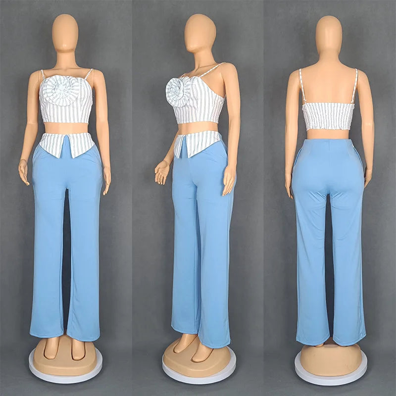 Short two-piece set with striped straps and floral appliqués, wide-legged pants