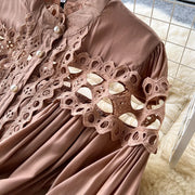 Long dress with embroidery, high neck, flared sleeves with high quality bows