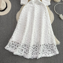 Elegant long white dress with V-necklines and three-quarter sleeves of high quality