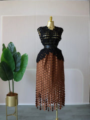 Women's two-piece set, featuring a round neck crop top and a long fitted midi skirt.