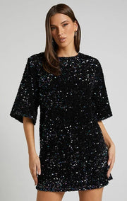 Sequin party dress with round neck and half sleeves provides a classic quality silhouette