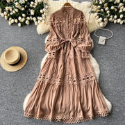 Long dress with embroidery, high neck, flared sleeves with high quality bows