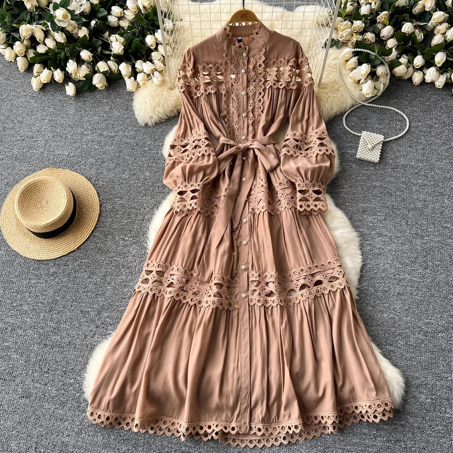 Long dress with embroidery, high neck, flared sleeves with high quality bows