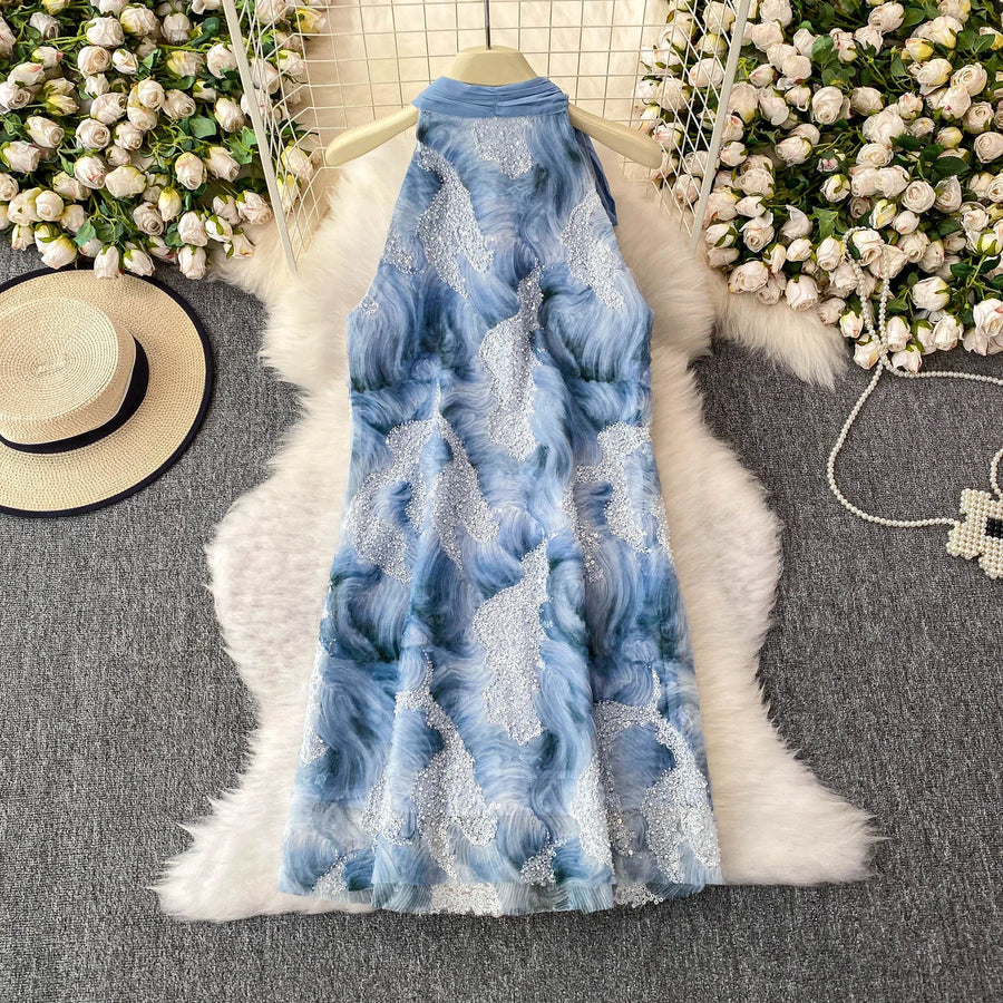 Elegant and beautiful women's dress in a vibrant color with heavy embroidered lace and high-quality sparkling sequins.
