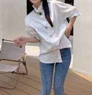 Shirt with buttons, ruffles, cotton stand-up collar and three-quarter sleeves of high quality