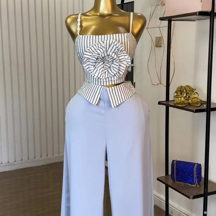 Short two-piece set with striped straps and floral appliqués, wide-legged pants