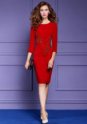 Elegant dress with sleeves in various colors with detail in high quality stones