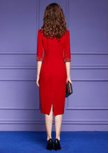 Elegant knee-length dress in red and black with high-quality stone detail