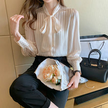 Striped long sleeved shirt with high quality bows