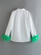 Elegant white long sleeve blouses with feathers on the cuffs