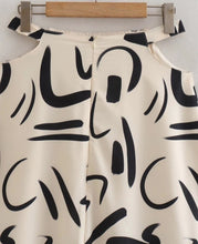 Hollow Out Waist Flare Skirt Graffiti Print Strapless Tops Set