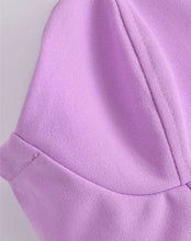 Short blouse with thin straps, open back, in purple, white and black