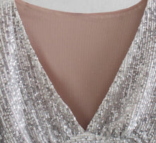 Sequin V-neckline crop top, elegant with pleats and puff sleeves