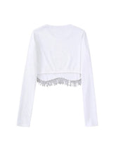 Black and white knit t-shirt with long sleeves tassel design