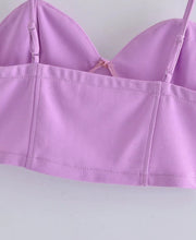 Short blouse with thin straps, open back, in purple, white and black