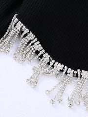 Black and white knit t-shirt with long sleeves tassel design